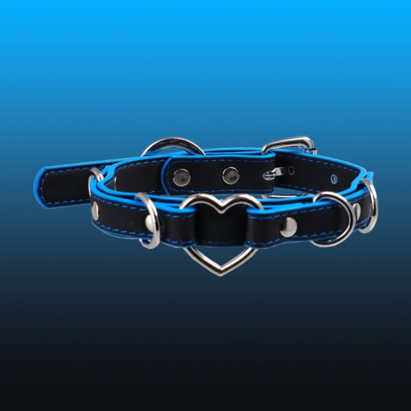 Exclusive Gothic choker for sub - culture dark and edgy individuals. Hand - made punk collar with a 31 - degree temperature - sensitive heart - shaped pendant that turns black or blue.