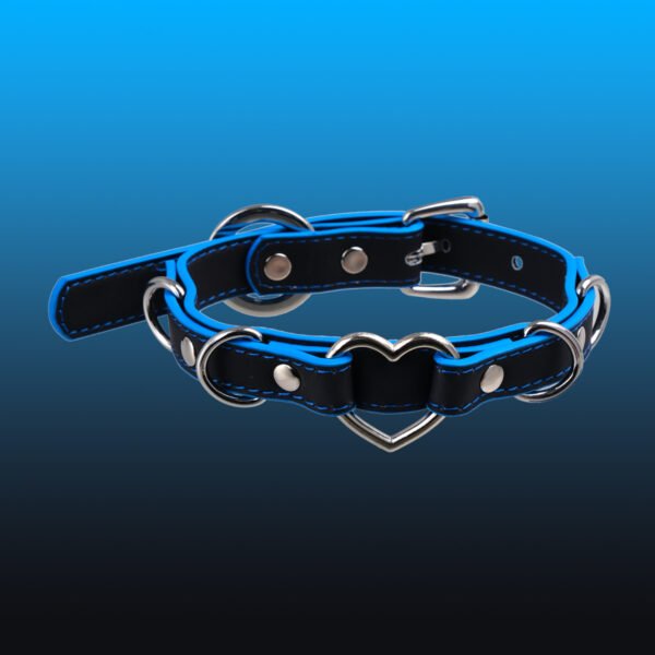 Exclusive Gothic choker for sub - culture dark and edgy individuals. Hand - made punk collar with a 31 - degree temperature - sensitive heart - shaped pendant that turns black or blue.